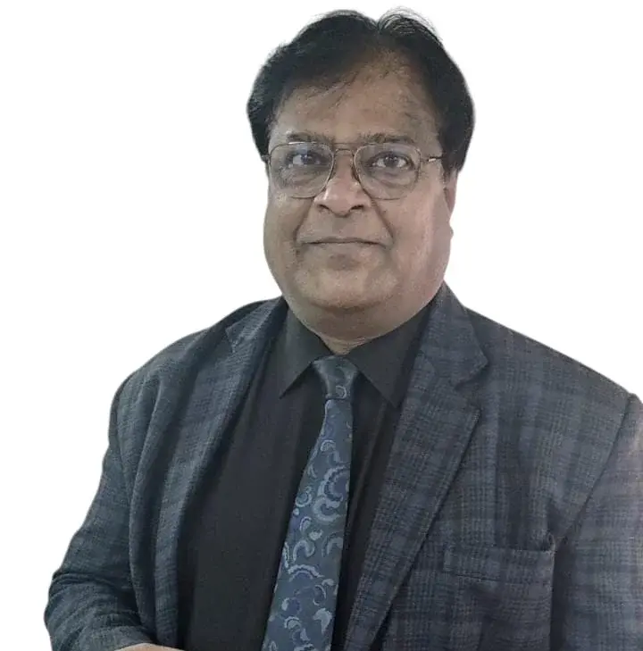 Kishore Samvatsar in a dark suit